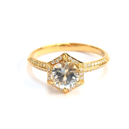 130 - A Kat Florence 18ct gold, white sapphire and diamond hexagonal cluster ring, the Ceylon white sapphi... 