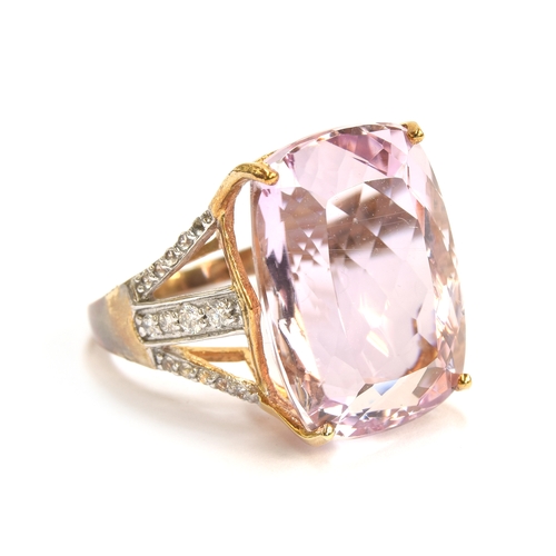 132 - A 9ct gold, Kunzite, diamond and white sapphire ring, the large kunzite 25cts and 20x15mm, size N 1/... 