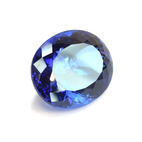 111 - A very large unmounted tanzanite, the oval mixed cut stone 32.18cts and measuring 22.32x17.45x11.63,... 