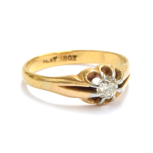 5 - An early 20th century 18ct gold diamond solitaire ring in a buttercup setting with platinum tipped c... 