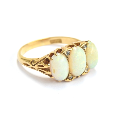 14 - A late 19th/early 20th century 18ct gold, diamond and opal three stone ring, approx. size Q, gross w... 