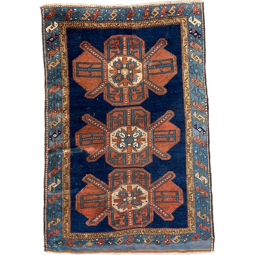 465 - A blue ground Persian rug, 193x124cm