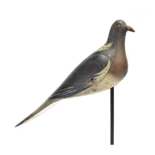 355 - A decoy pigeon, 19th century, carved and painted and mounted on a stand, approx. 38cm long

Provenan... 