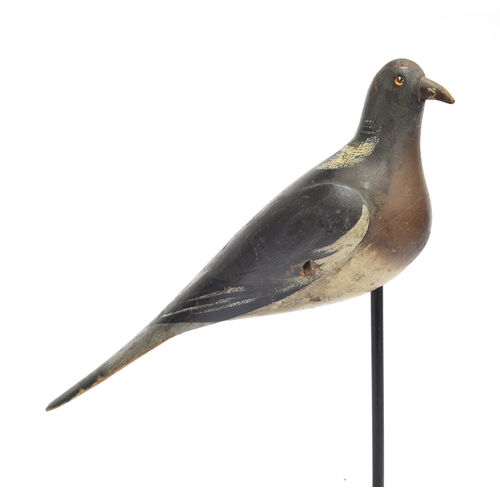 355 - A decoy pigeon, 19th century, carved and painted and mounted on a stand, approx. 38cm long

Provenan... 