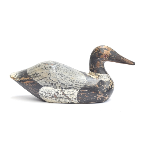 353 - A small naive duck decoy, 27cm long

Provenance: private collection, Branksome, Poole