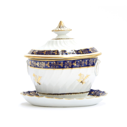 248 - An early 19th century Caughley Salopian porcelain part tea service, cobalt blue and gilt thistle des... 