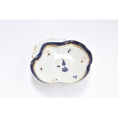 248 - An early 19th century Caughley Salopian porcelain part tea service, cobalt blue and gilt thistle des... 