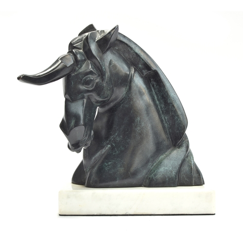 213 - A verdigris patinated stylised bronze bust of a unicorn, on a white marble base, numbered 1/36, indi... 