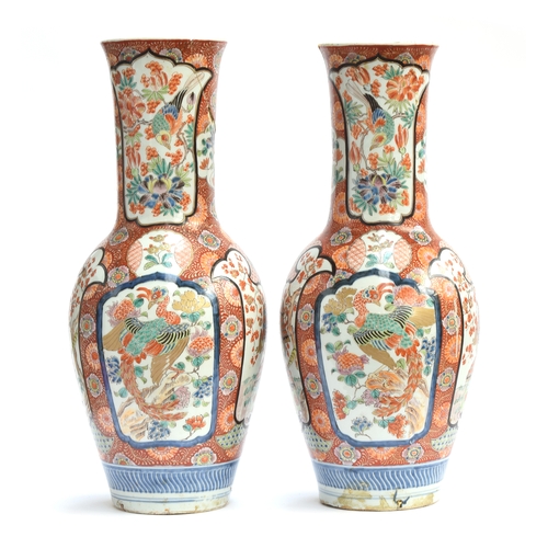 262 - A pair of large decorative Japanese vases, depicting samurai and phoenix in polychrome enamel decora... 