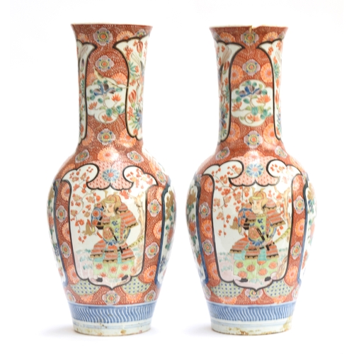 262 - A pair of large decorative Japanese vases, depicting samurai and phoenix in polychrome enamel decora... 