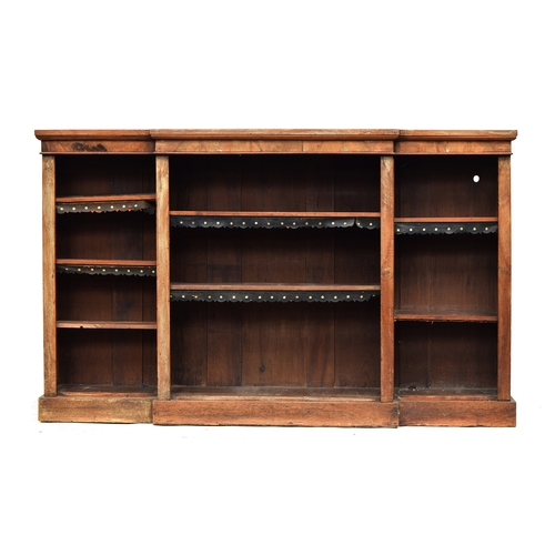 412 - A Regency mahogany breakfront bookcase with adjustable shelves, 182cm wide, 33cm deep, 112cm high