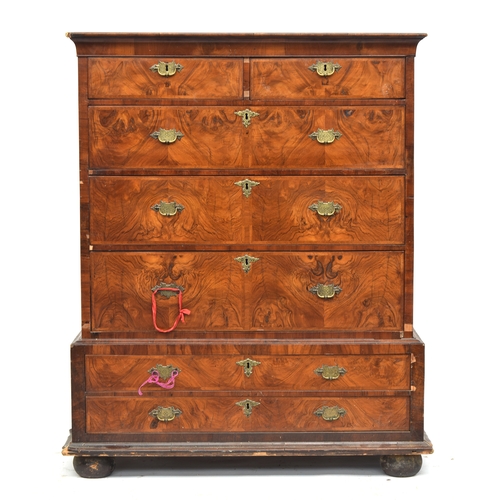 371 - An early 18th century walnut chest on chest, the top with two short over three long featherbanded dr... 