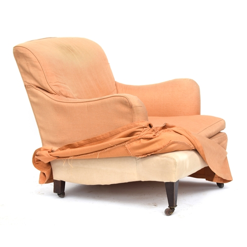 438 - An early 20th century armchair in the manner of the Howard Bridgewater, 80cm wide