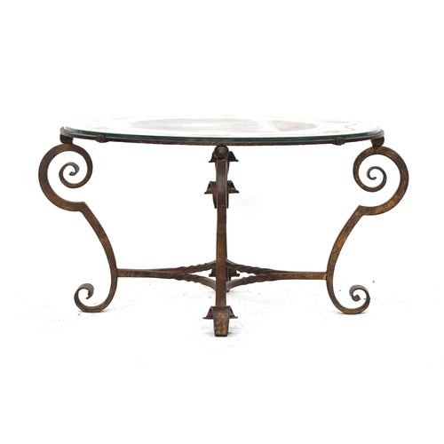 458 - A wrought iron circular coffee table with glass top