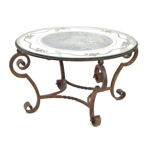 458 - A wrought iron circular coffee table with glass top