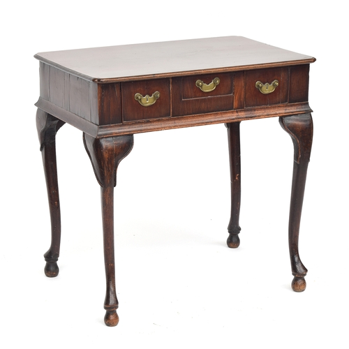 375 - A George II mahogany lowboy, the moulded top with reentrant corners, over three drawers, on carved c... 