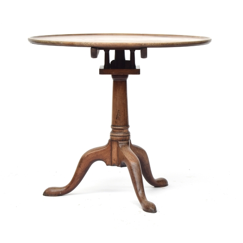 387 - A George III mahogany tripod table, the dished tilt top with birdcage action, on plain turned column... 