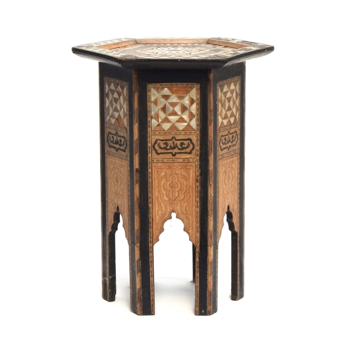 433 - A small mother of pearl inlaid hexagonal Moorish table, 32cm wide, 47cm high