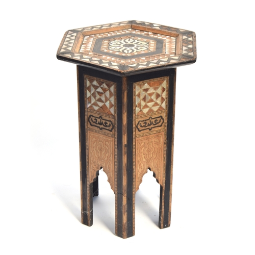 433 - A small mother of pearl inlaid hexagonal Moorish table, 32cm wide, 47cm high