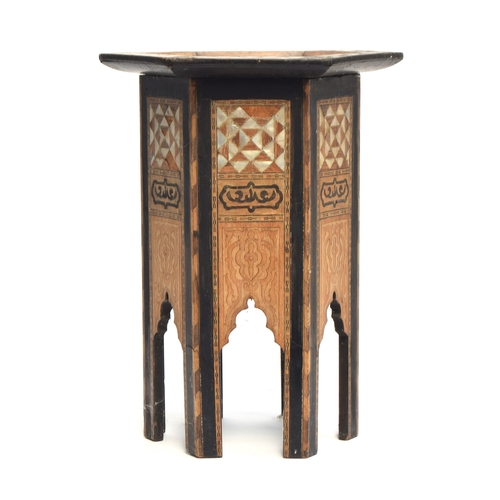 433 - A small mother of pearl inlaid hexagonal Moorish table, 32cm wide, 47cm high