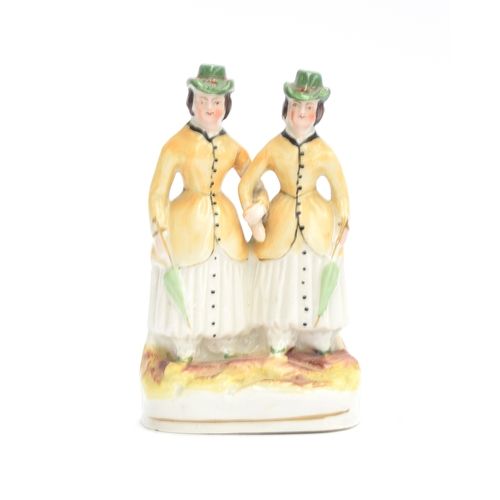 238 - A mid 19th century Staffordshire figure of 'The Alphington Ponies' (Annie and Eliza Durnford), 11.5c... 