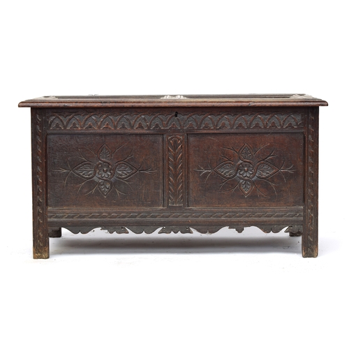 361 - A 17th century and later carved to panel oak coffer, 122cm wide, 55cm deep, 66cm high