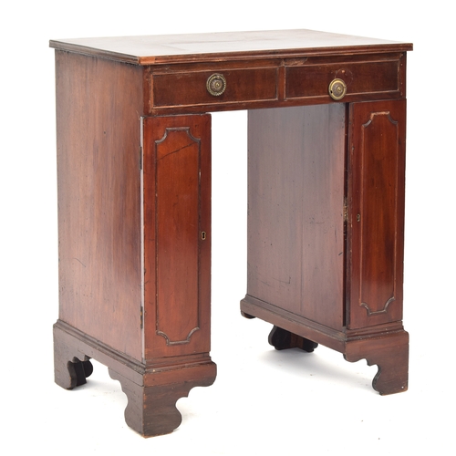 408 - A unusually proportioned George III kneehole writing desk, with eight drawers, the pedestals with do... 