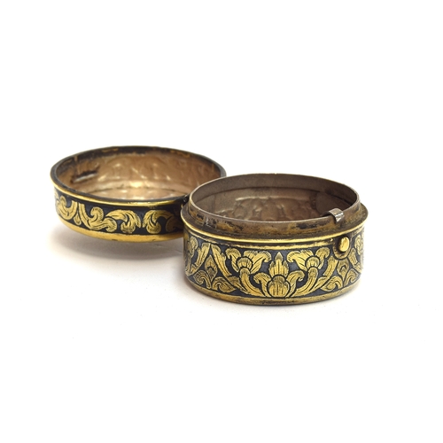 265 - A 19th century Thai niello silver gilt lidded pot, 4.3cm diameter, 3cm high, 47g