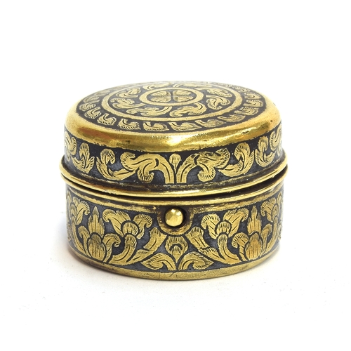 265 - A 19th century Thai niello silver gilt lidded pot, 4.3cm diameter, 3cm high, 47g