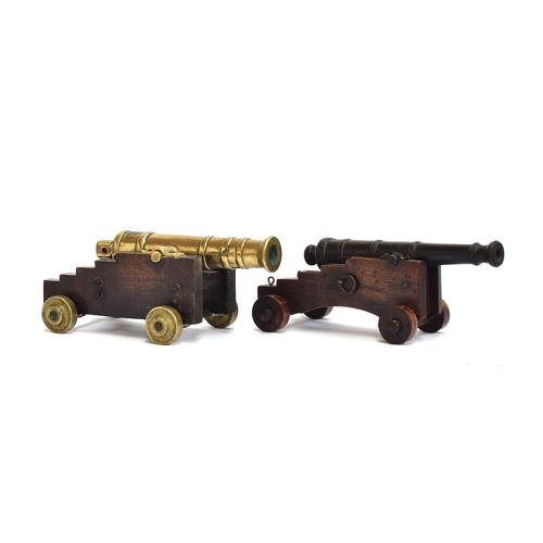 219 - Two antique desk cannons, one bronze and one brass, on later wooden bases, the barrels 21.5cm and 20... 