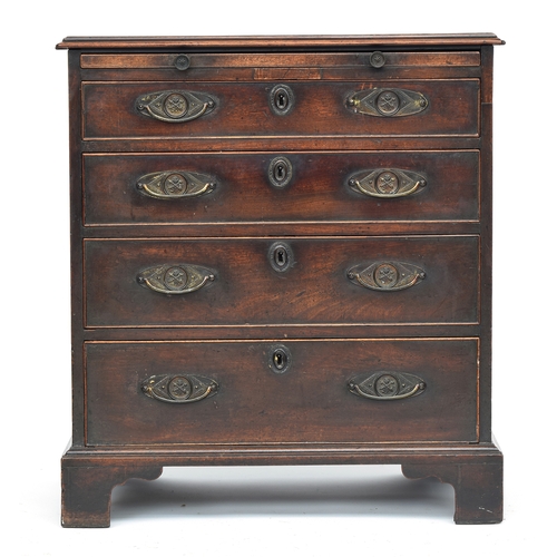 379 - A neat George III mahogany bachelor's chest, with brushing slide over four graduating drawers, on br... 