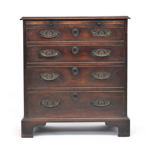 379 - A neat George III mahogany bachelor's chest, with brushing slide over four graduating drawers, on br... 