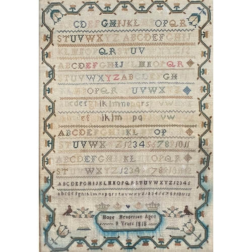 275 - A Georgian needlework alphabet sampler, worked by Hope Henderson Aged 9, 1818, with a floral border ... 