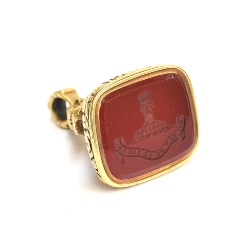 2 - A Georgian yellow metal seal, the carnelian intaglio carved with a King above the Royalist motto 'Du... 