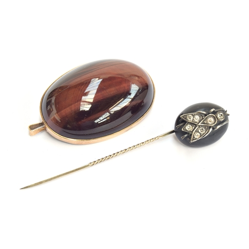 9 - A Victorian stickpin modelled as a silver and paste fly on a vulcanite cabochon, 8cmL; together with... 