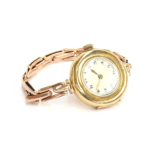 160 - An Art Deco 9ct gold ladies Swiss made wristwatch, the enamel dial with Arabic numerals, 2.7cm diame... 