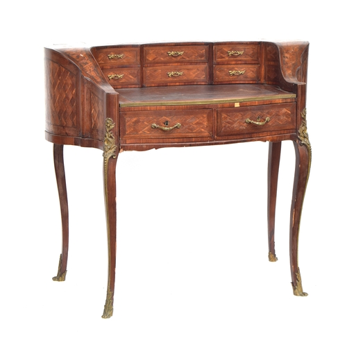 405 - A 19th century Dutch parquetry desk, the superstructure with six drawers, pull out top, over two fri... 