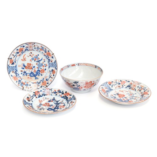 256 - Three 19th century Chinese export dishes, 23cm diameter; together with a similar bowl, 20cm diameter... 