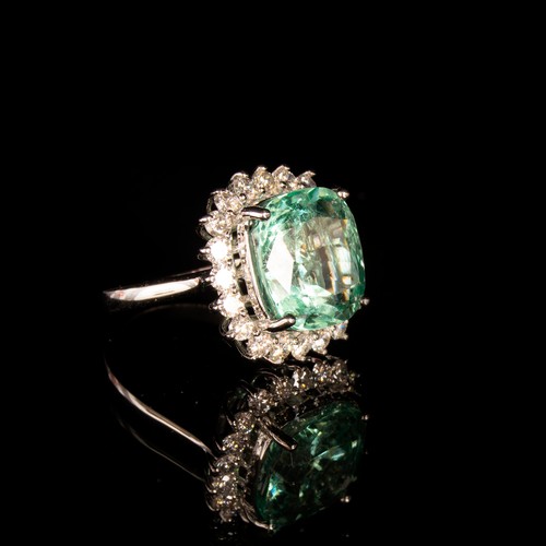 37 - A platinum, emerald and diamond cluster ring, the Boyaca Colombian emerald weighing 11cts and measur... 