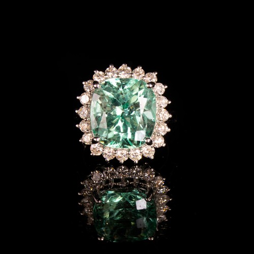 37 - A platinum, emerald and diamond cluster ring, the Boyaca Colombian emerald weighing 11cts and measur... 