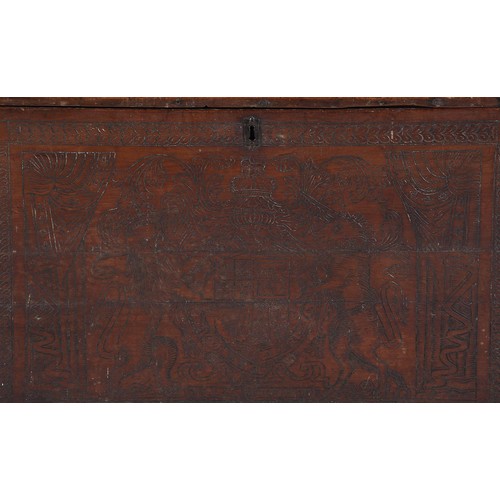 360 - A Charles II and later cedar and pokerwork decorated coffer, the front panel poker decorated with th... 