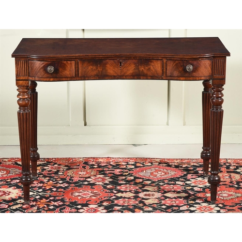 418 - A Regency mahogany side table, c.1820, in the manner of Gillows, with inverted serpentine front inco... 