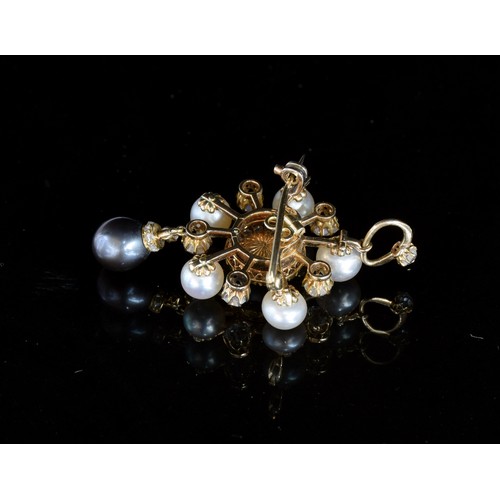 13 - An early 20th century gold, diamond and pearl pendant brooch, the central grey pearl 0.8cm diameter ... 