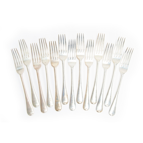 165 - A set of 13 Hanoverian pattern silver table forks, nine by Josiah Williams & Co, London 1932, four b... 