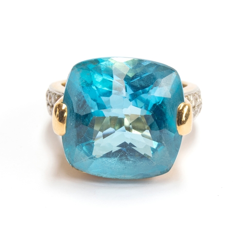 29 - A heavy 18ct gold, blue topaz and diamond ring, the topaz 11x11mm, size O, 14g