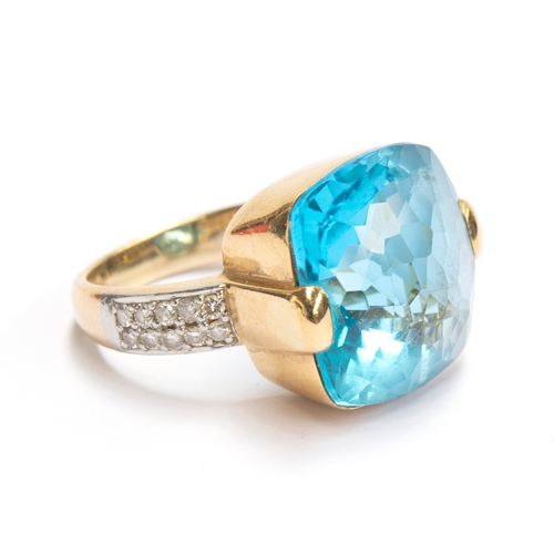 29 - A heavy 18ct gold, blue topaz and diamond ring, the topaz 11x11mm, size O, 14g