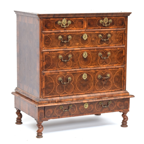 364 - A fine William & Mary walnut and olivewood oyster veneered chest on stand, c.1690, the invert moulde... 