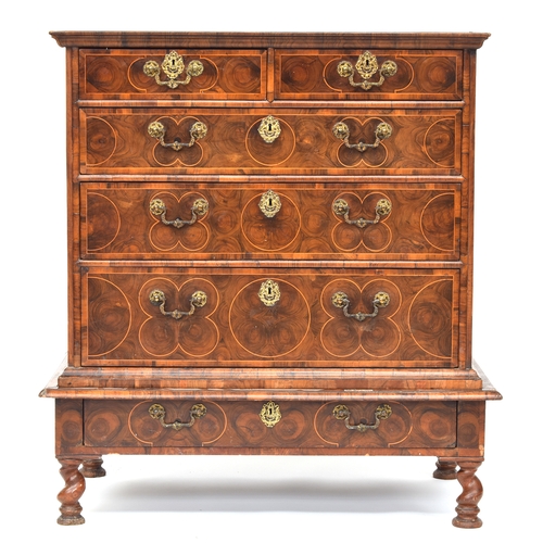 364 - A fine William & Mary walnut and olivewood oyster veneered chest on stand, c.1690, the invert moulde... 