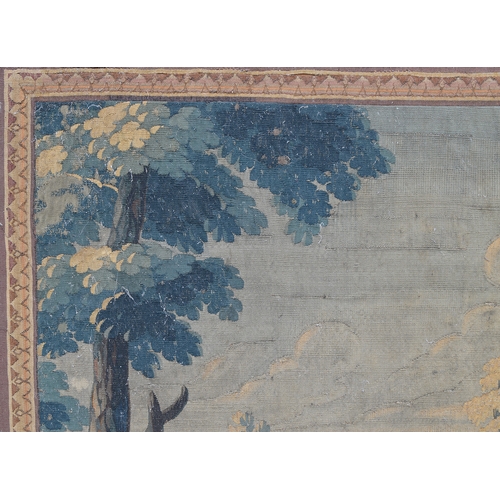 351 - An 18th century Soho tapestry, depicting a knight and lady in a landscape, with maze in background, ... 