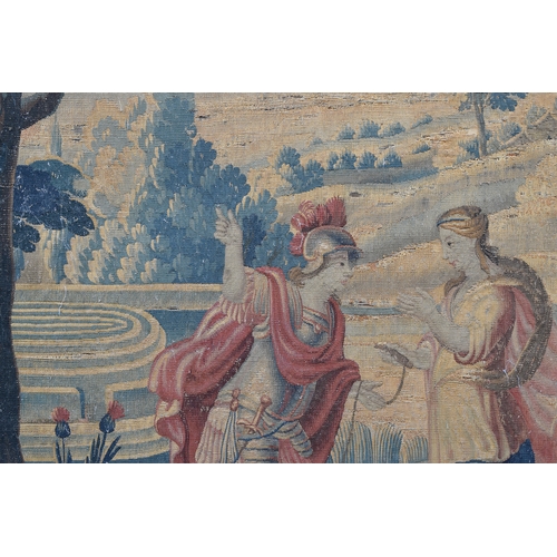 351 - An 18th century Soho tapestry, depicting a knight and lady in a landscape, with maze in background, ... 